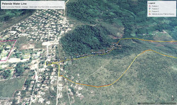 Satellite image of Sisters of Notre Dame de Namur Pelende community. Yellow line shows water line from source to overhead tanks. Overlayed red line shows vehicle access road to source.
