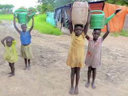 Girls carrying water picture