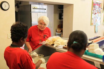 Sister Judy working in the kitchen